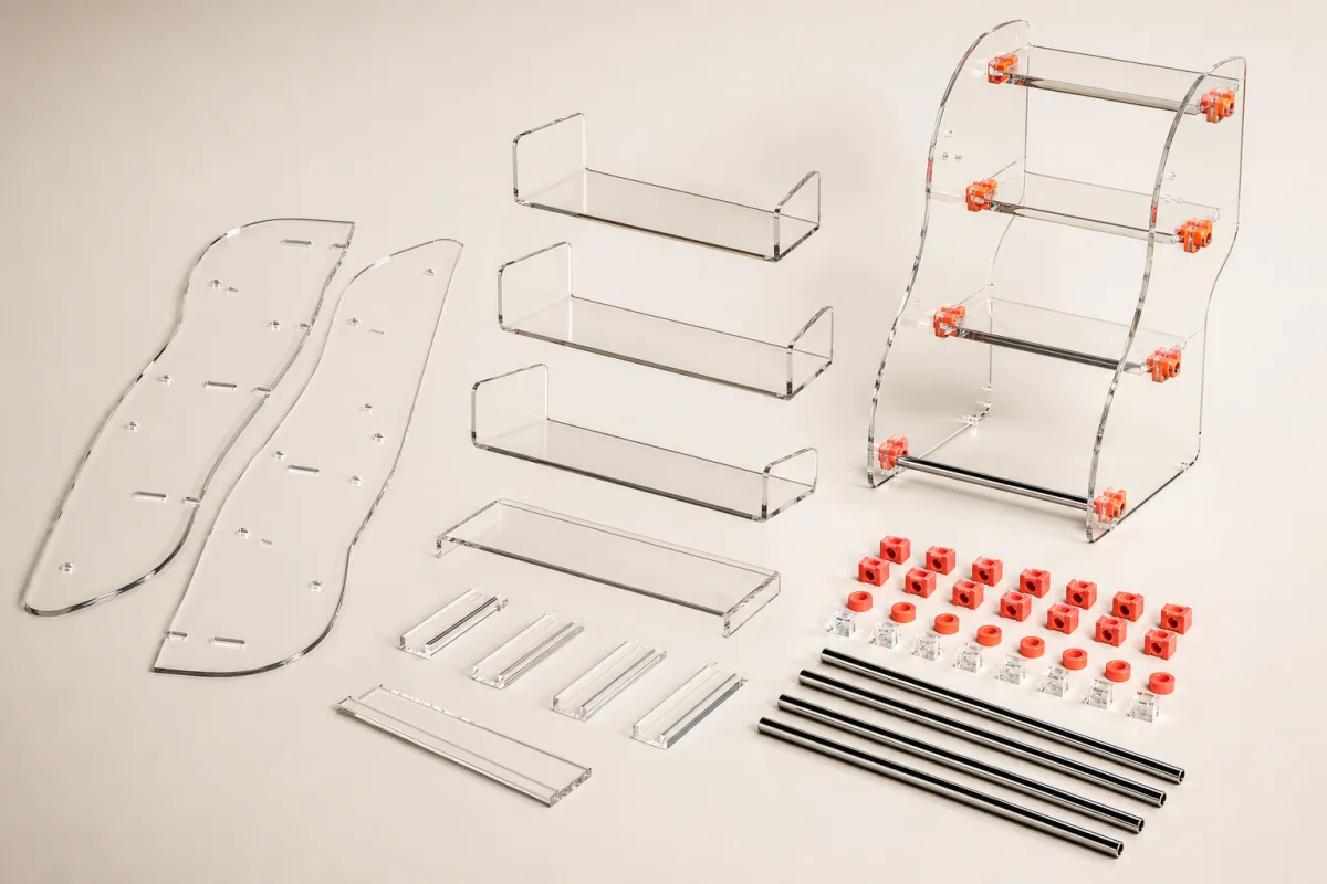 Acrylic Display Parts shown as a custom retail merchandising structure